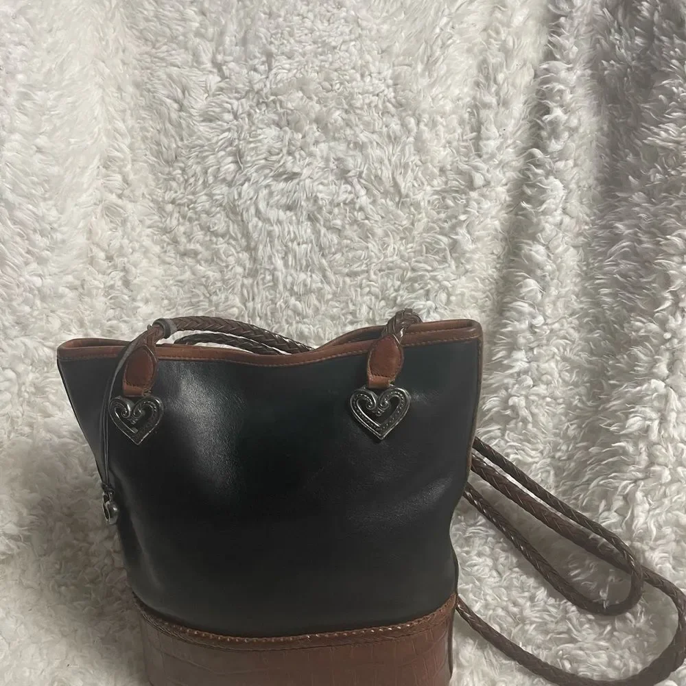 Brighton leather Black and Brown crocs print bucket style shoulder bag .